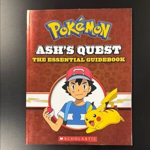 Pokémon | Ash’s Quest: The Essential Guidebook - Scholastic Softcover Book